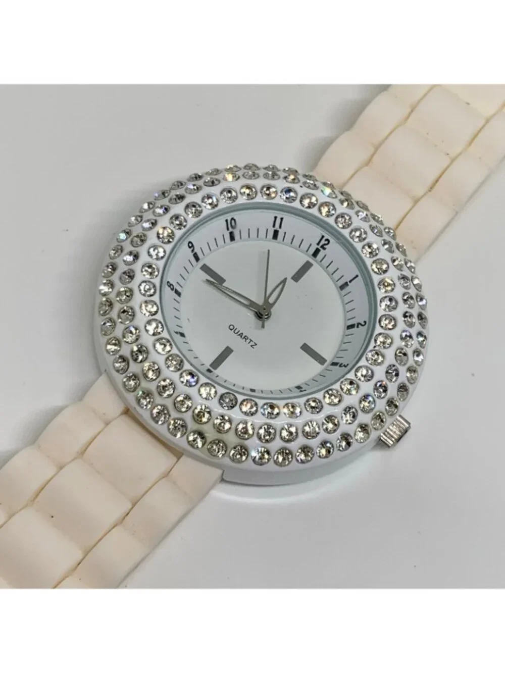 Geneva women’s watch white tone rhinestones 45mm silicone band running